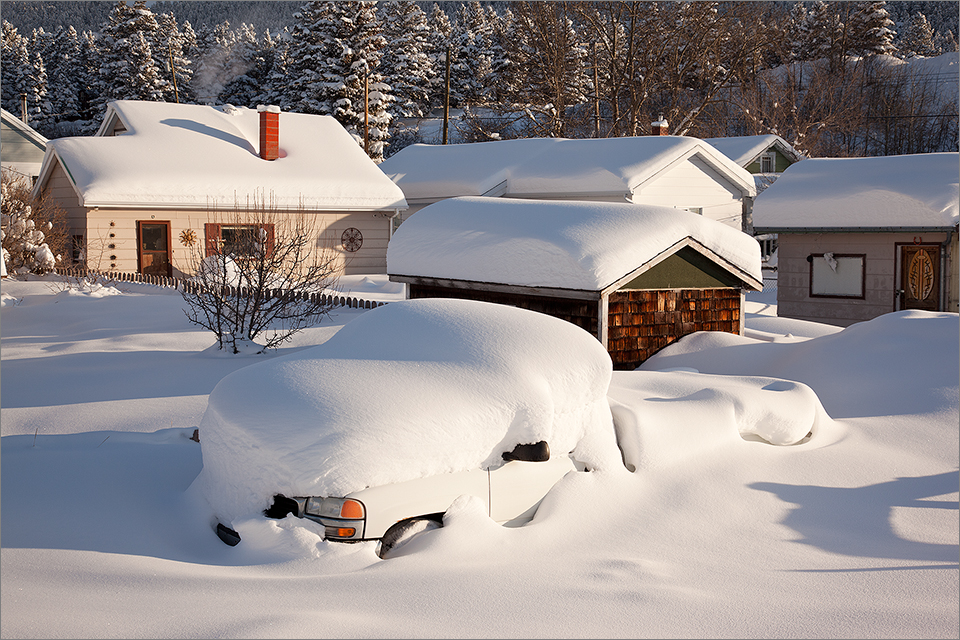 Snow-covered pickup truck