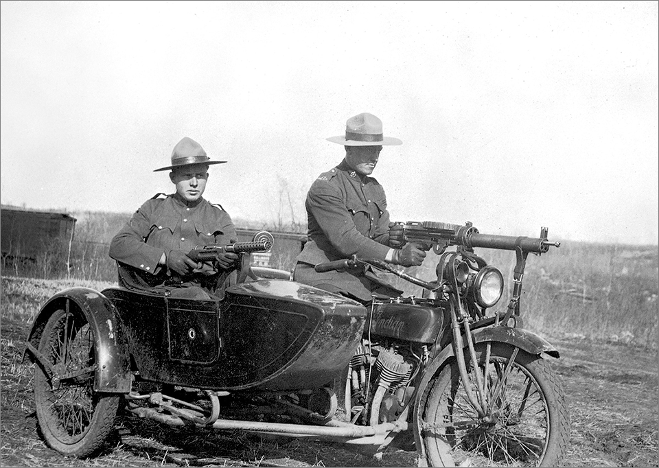 APP Indian motorcycle & sidecar, with guns at the ready