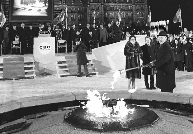 Prime Minister Pearson lighting the Centennial Flame