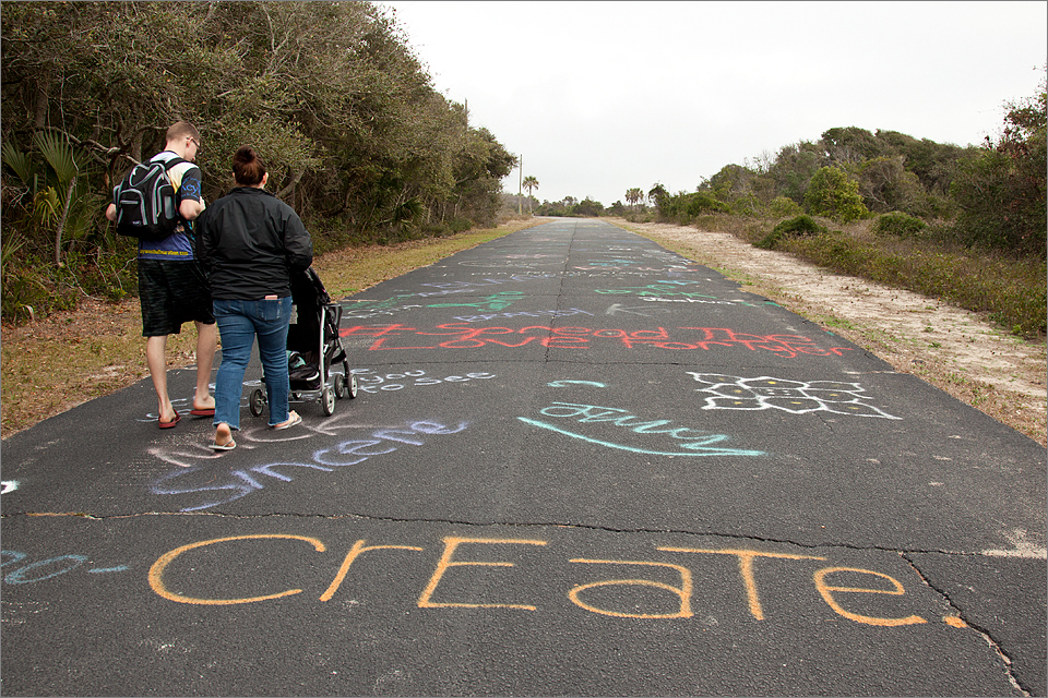 Young couple with a baby stroller. Create, they did!