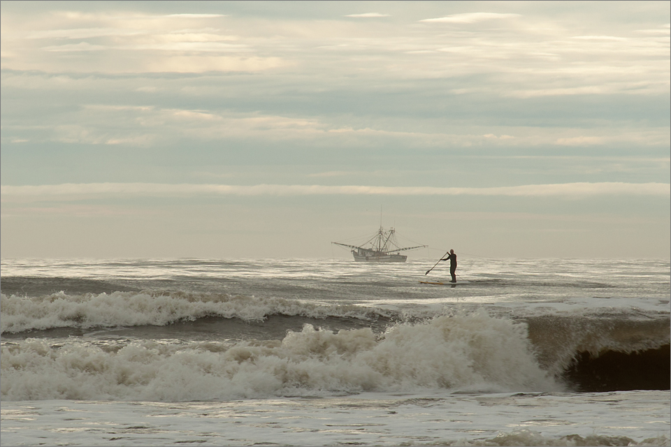 Paddle boarding and trawling for shrimp